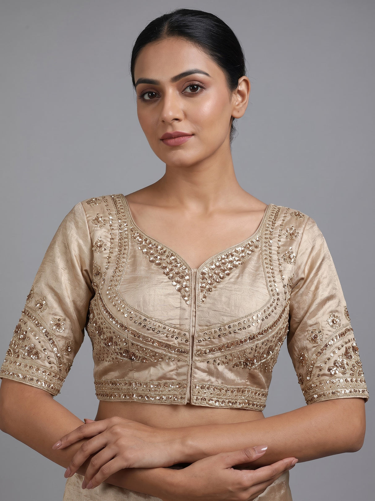 Beige silk unstitched lehenga choli with exquisite zardosi artistry