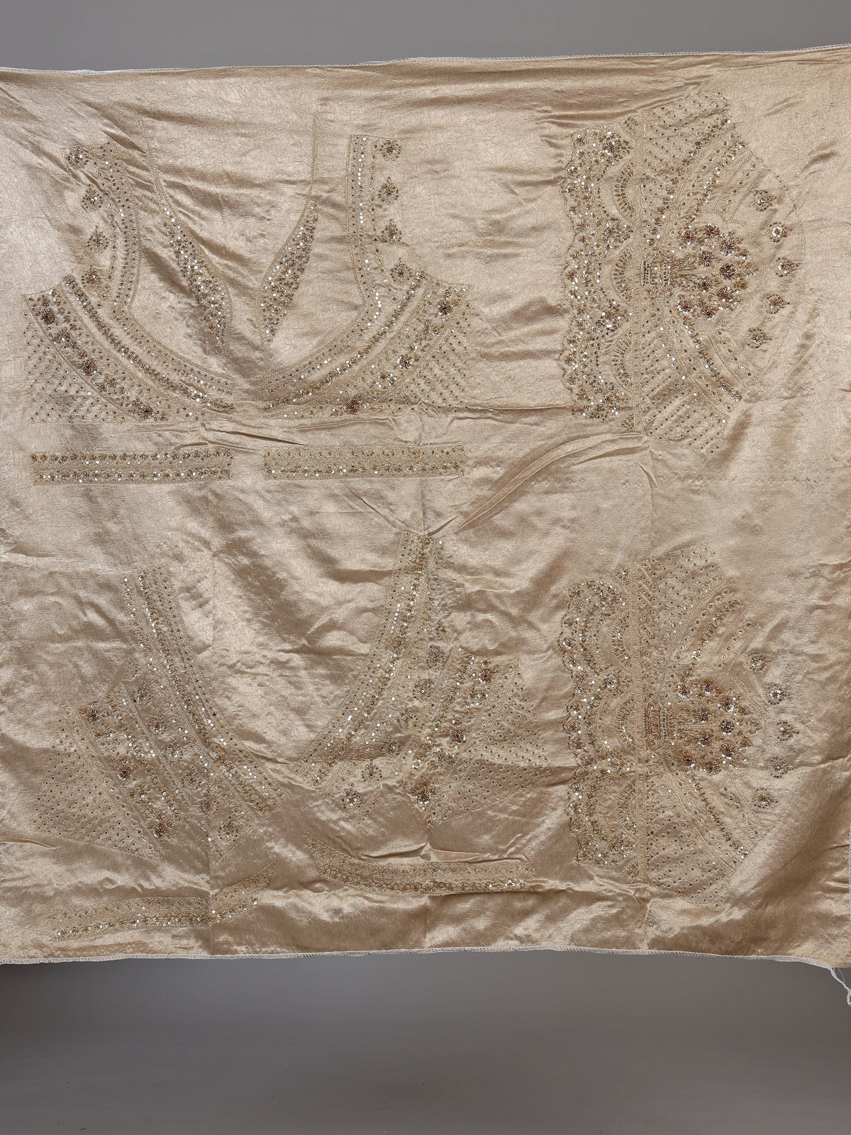 Beige silk unstitched lehenga choli with exquisite zardosi artistry