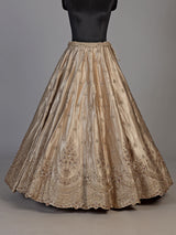 Beige silk unstitched lehenga choli with exquisite zardosi artistry