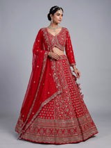 Red silk lehenga choli with exquisite resham and cutdana detailing