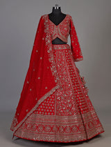 Red silk lehenga choli with exquisite resham and cutdana detailing