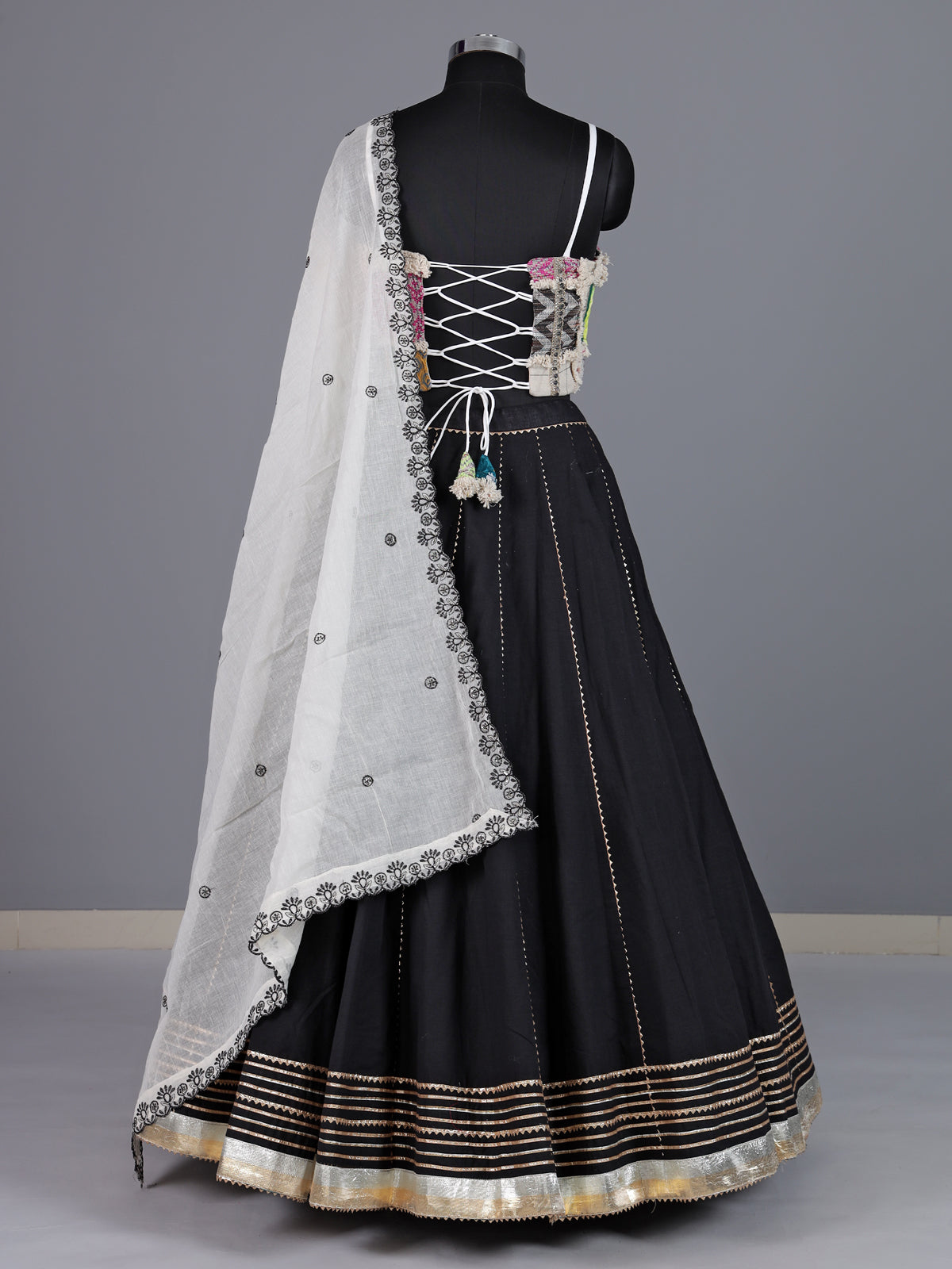 Black cotton silk blend lehenga choli with exquisite gota embellishments