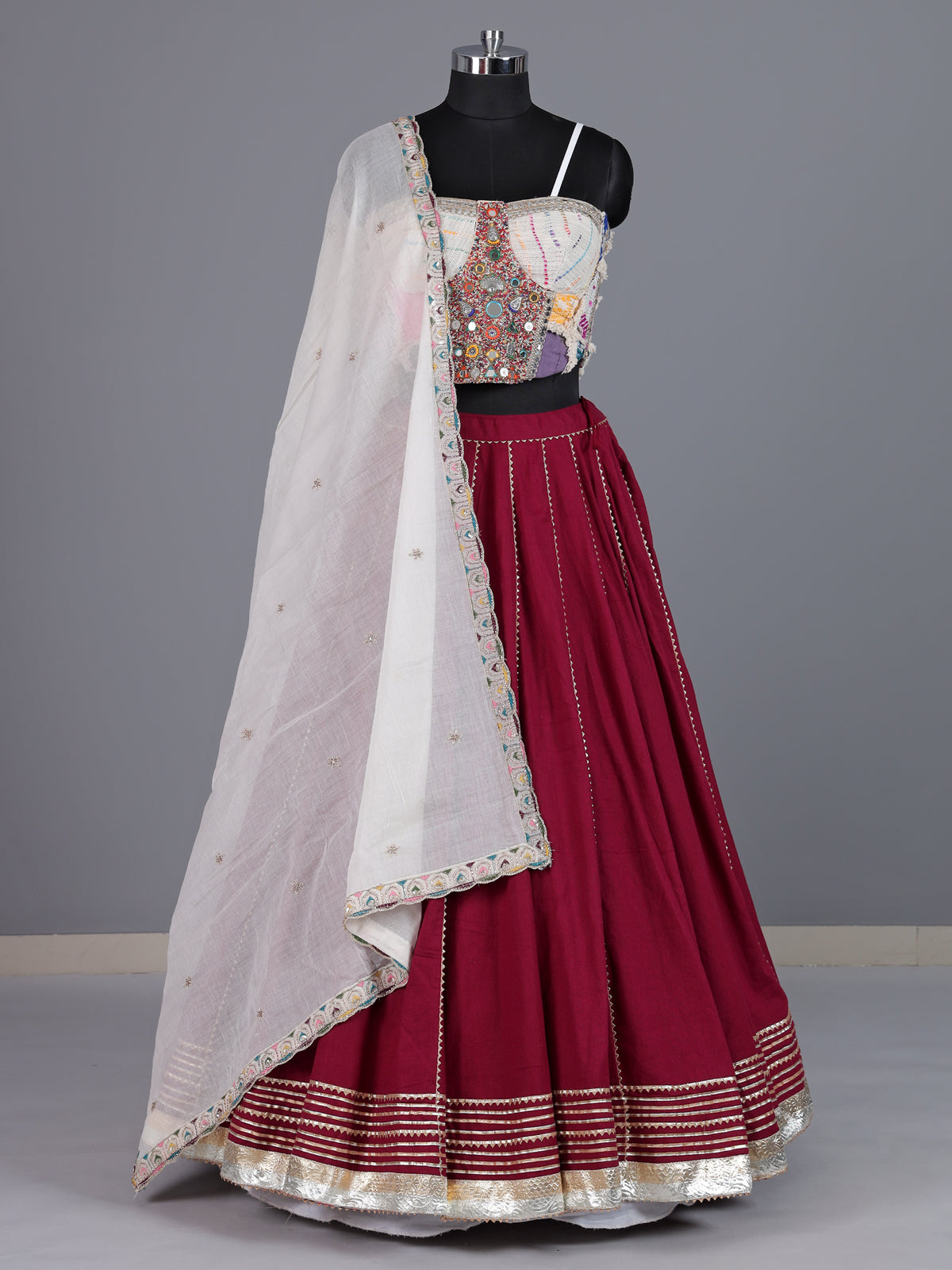 Maroon cotton silk blend lehenga choli with ornate gota embellishments
