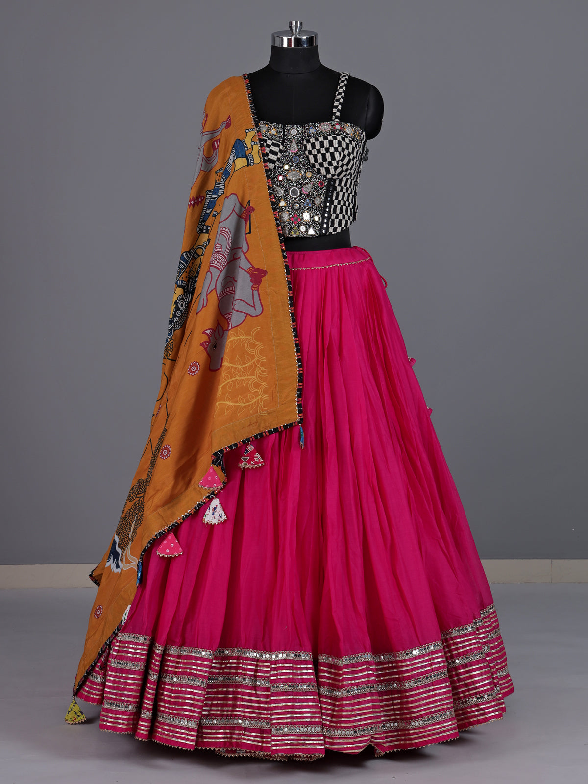 Rani pink pure silk blend lehenga choli with ornate mirror detailing