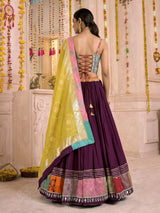 Wine pure silk blend lehenga choli with intricate floral festive detailing