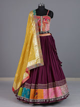 Wine pure silk blend lehenga choli with intricate floral festive detailing