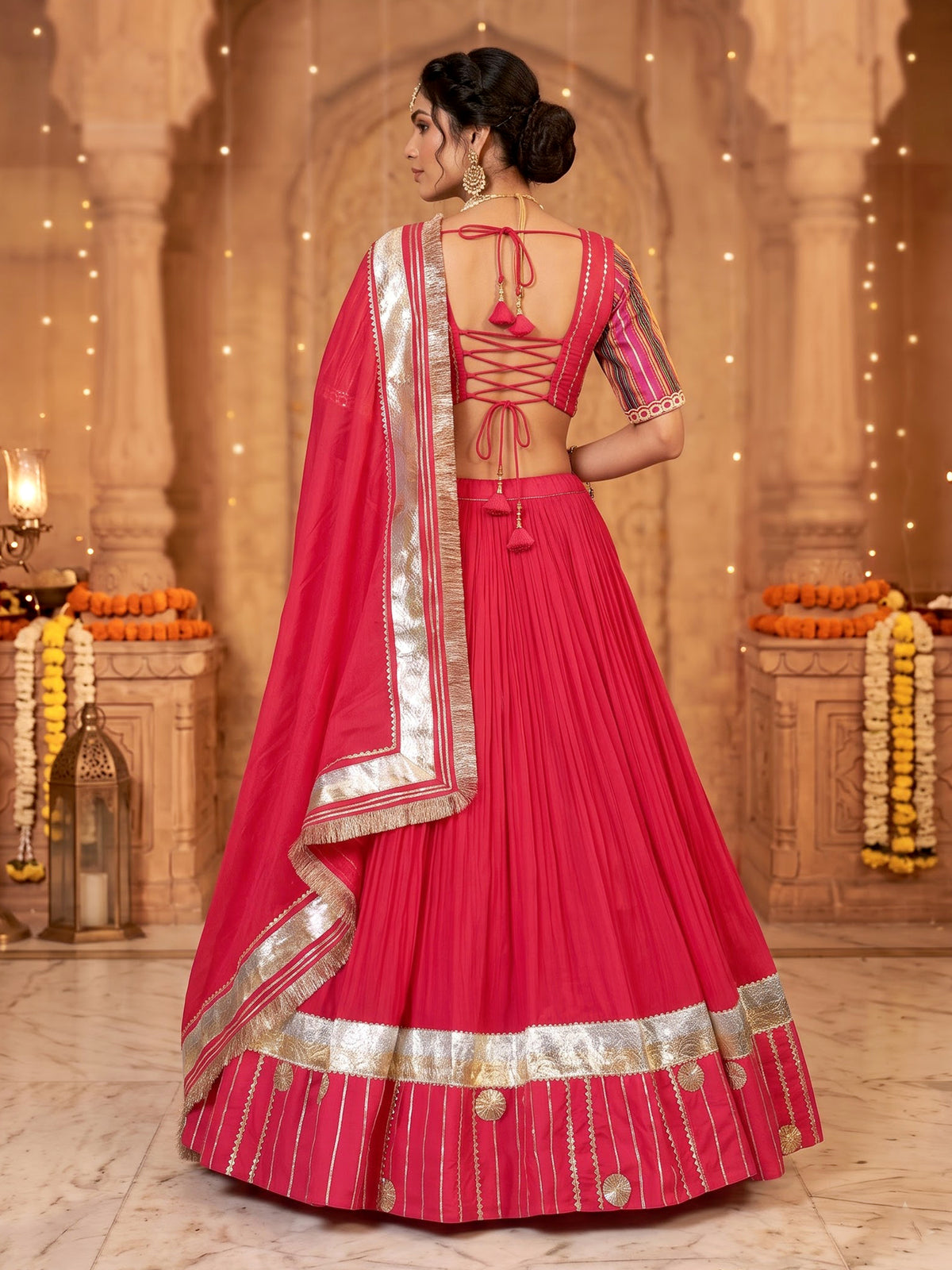Rani pink chiffon silk lehenga choli with exquisite festive embellishments