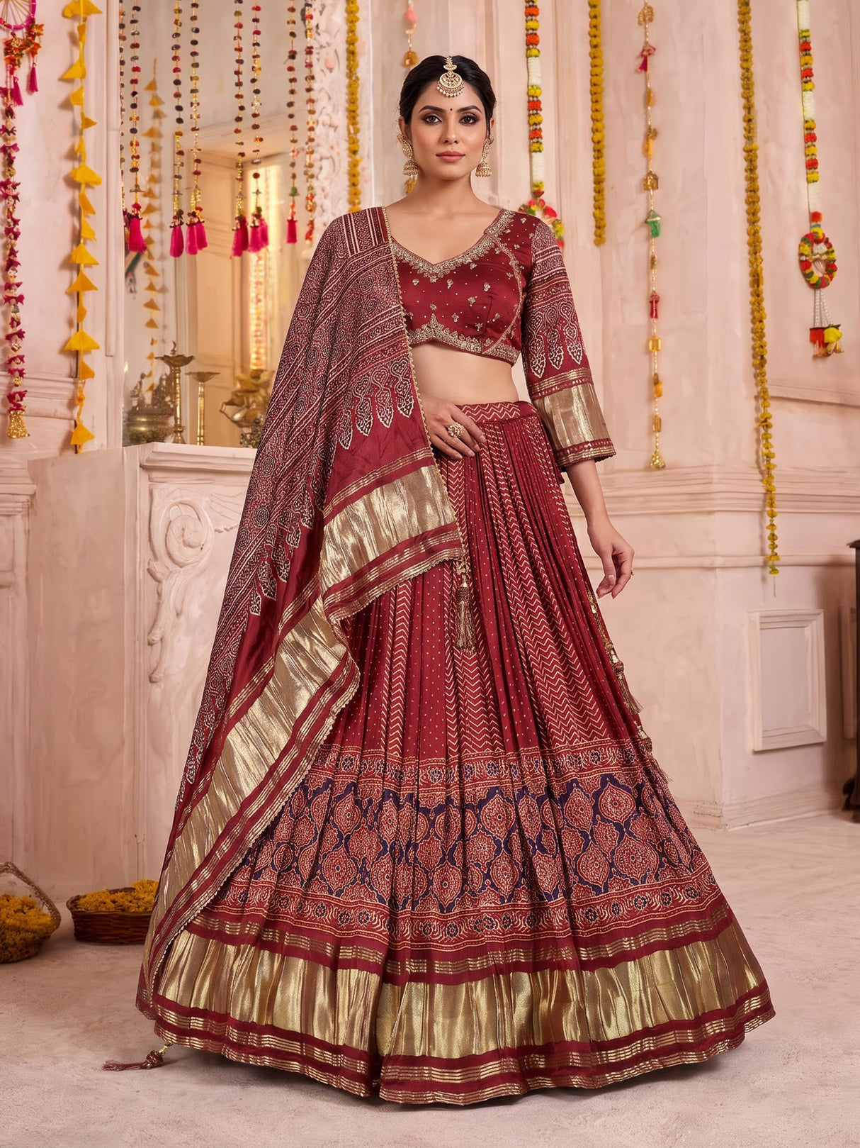 Maroon gajji silk lehenga choli with regal festive embellishments