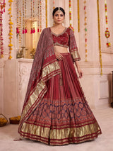 Maroon gajji silk lehenga choli with regal festive embellishments