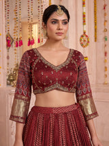 Maroon gajji silk lehenga choli with regal festive embellishments