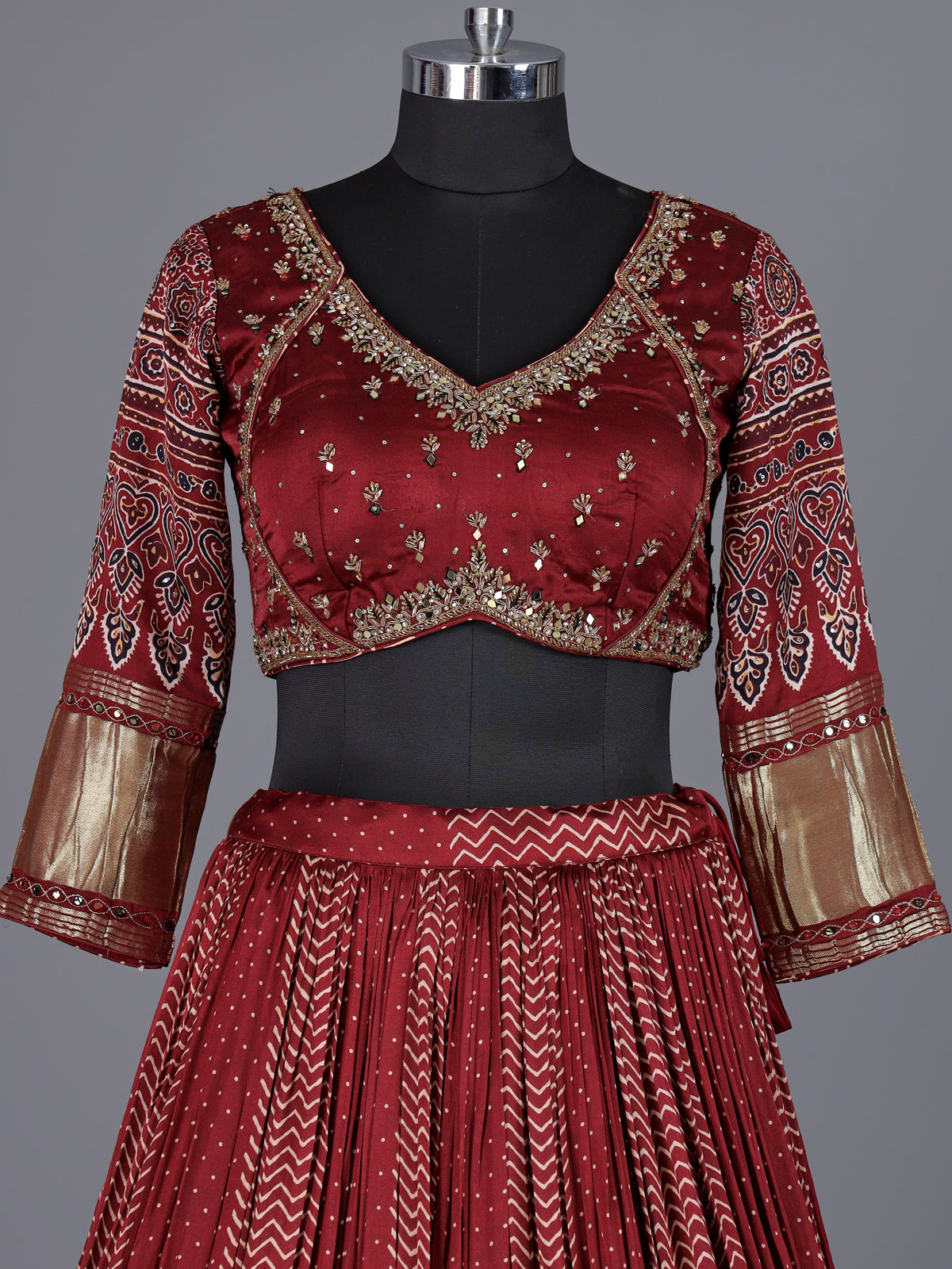Maroon gajji silk lehenga choli with regal festive embellishments