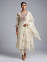 Cream tissue silk salwar suit with elegant yoke detailing