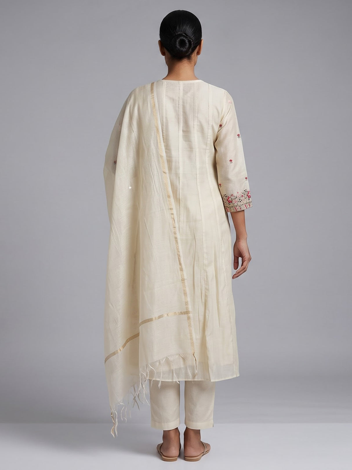 Cream tissue silk salwar suit with elegant yoke detailing