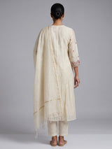 Cream tissue silk salwar suit with elegant yoke detailing