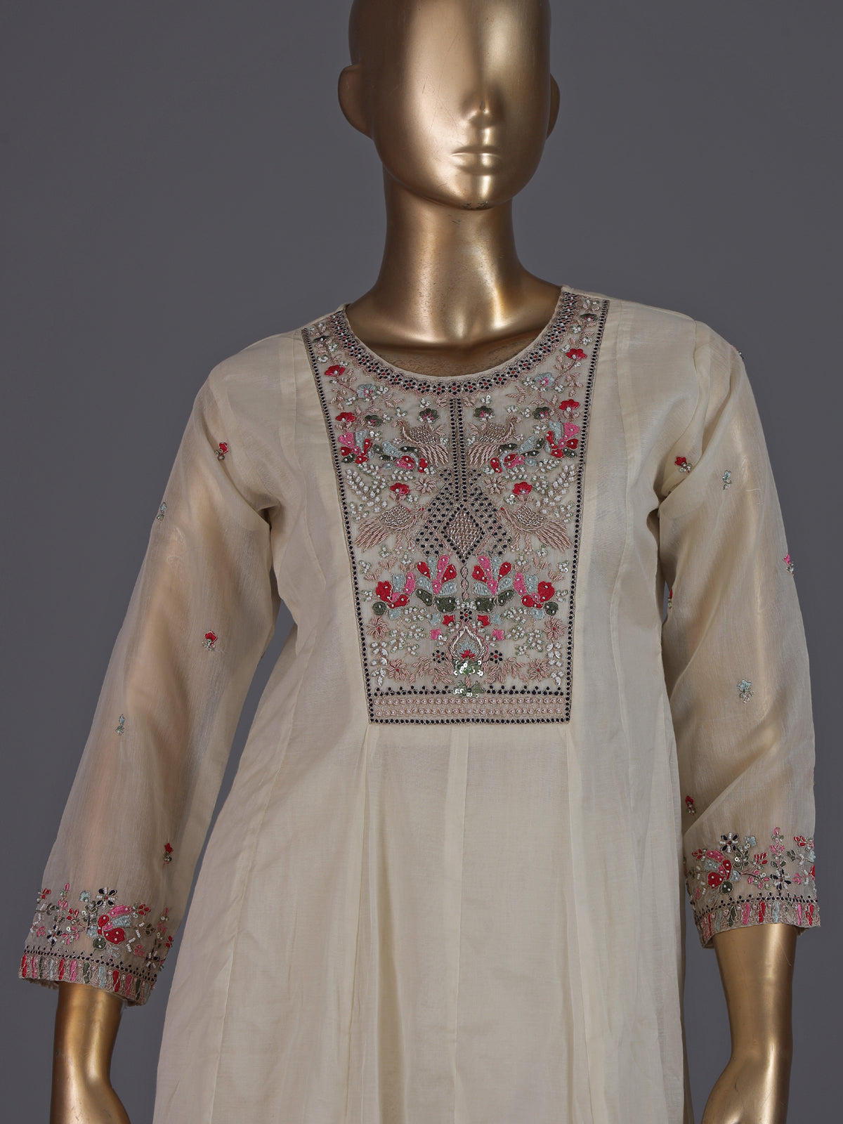 Cream tissue silk salwar suit with elegant yoke detailing