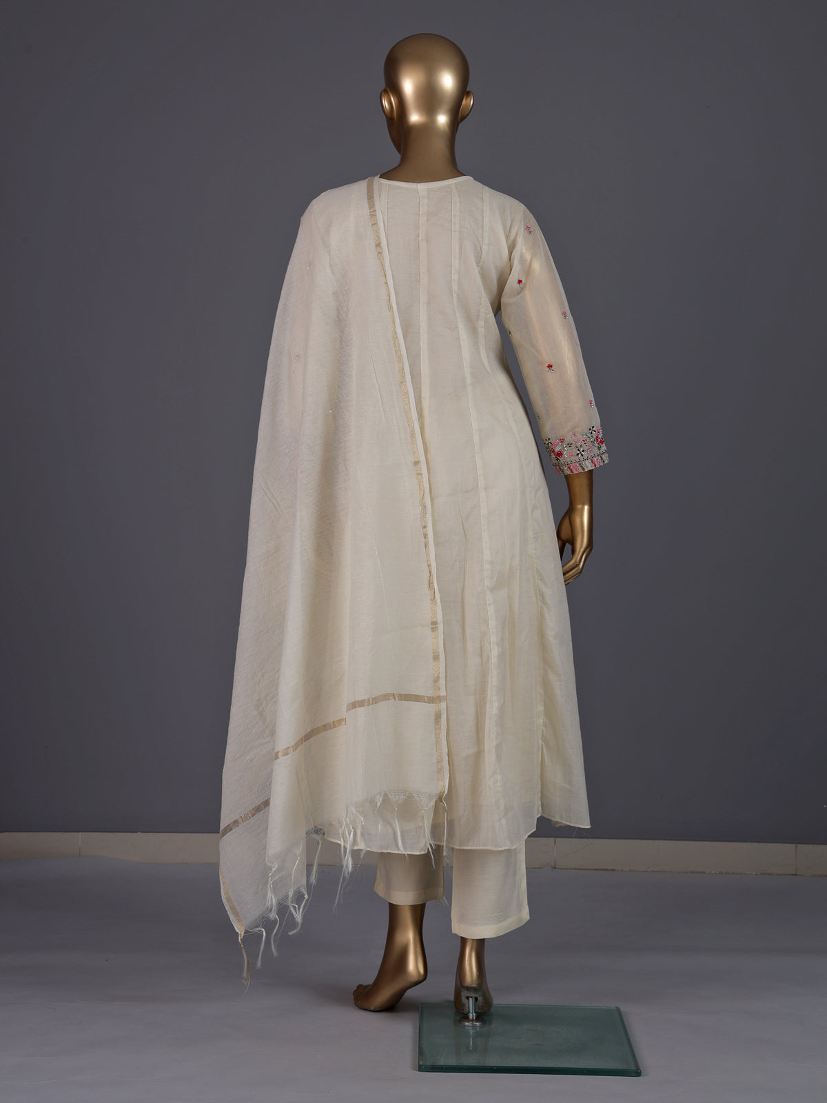 Cream tissue silk salwar suit with elegant yoke detailing