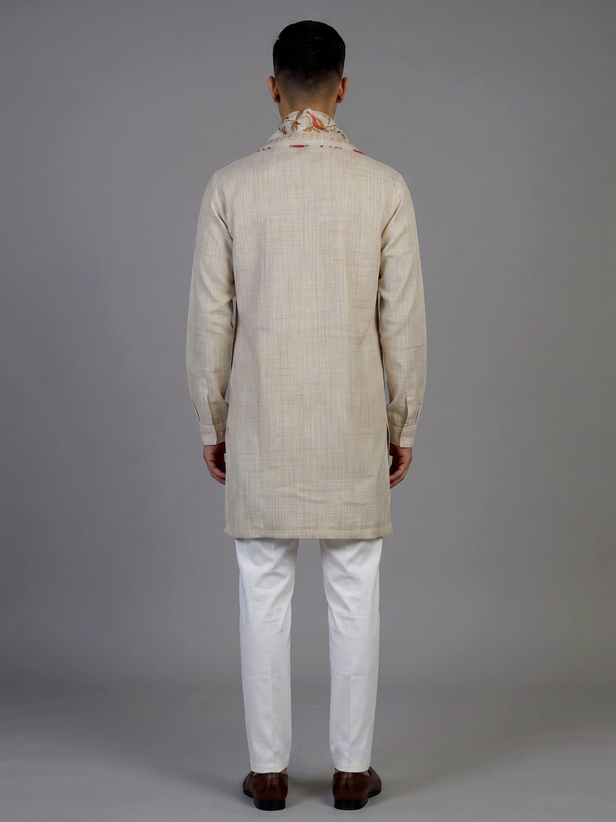 Beige linen silk mens kurta suit with neck stonework and bird motif