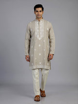 Beige linen silk mens kurta suit with elegant butti embroidery