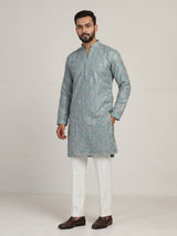 Sky blue silk mens kurta suit with elegant sequined aabla work
