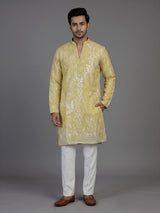 Yellow silk mens kurta suit with sparkling aabla and sequin work