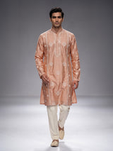 Peach raw silk mens kurta suit with intricate sequin and butti work