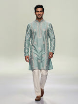 Mint blue raw silk mens kurta suit with graceful butti detailing