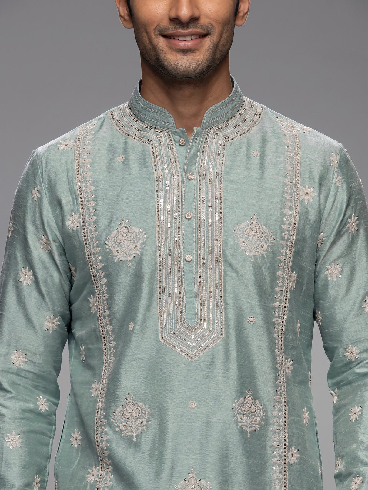 Mint blue raw silk mens kurta suit with graceful butti detailing
