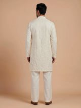 Cream linen silk mens kurta suit with refined embroidered detailing