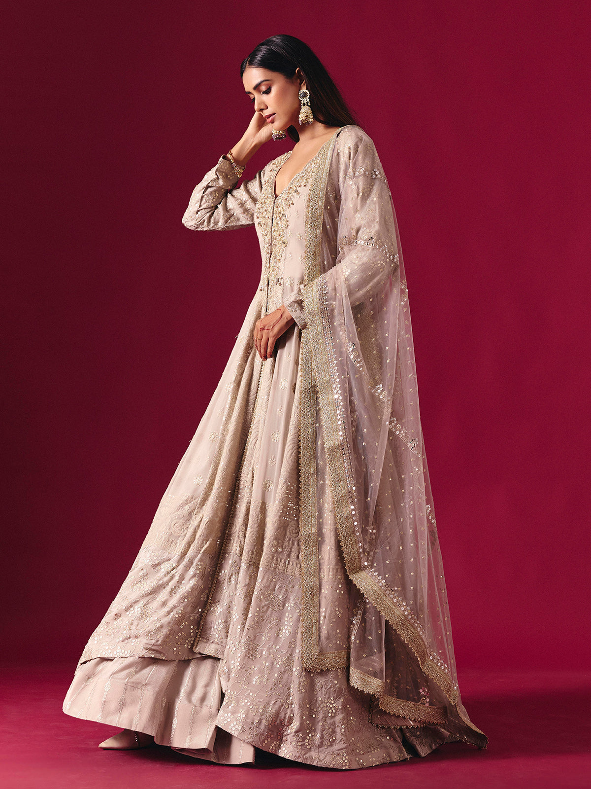 Elegant beige georgette salwar suit with embellished lehenga and dupatta