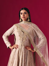 Elegant beige georgette salwar suit with embellished lehenga and dupatta
