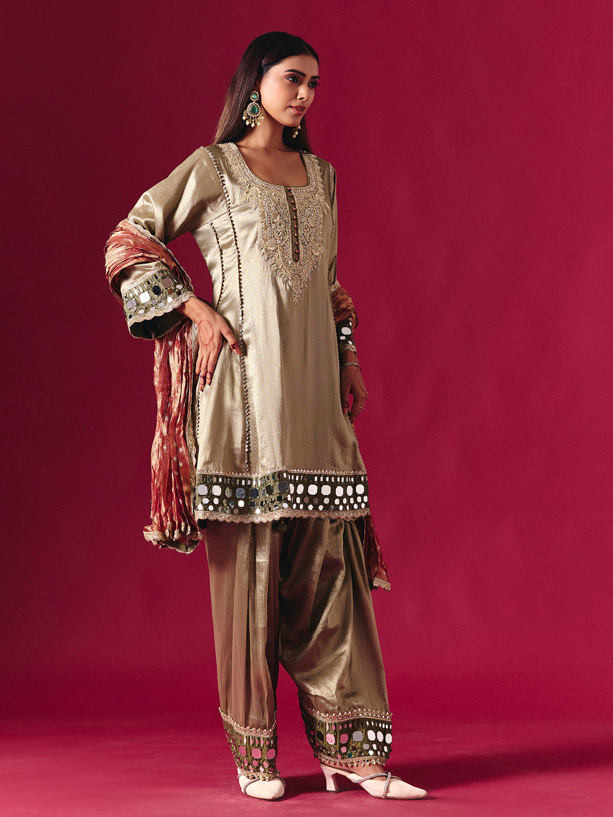 Regal gold silk salwar suit with zardosi embellished dupatta elegance