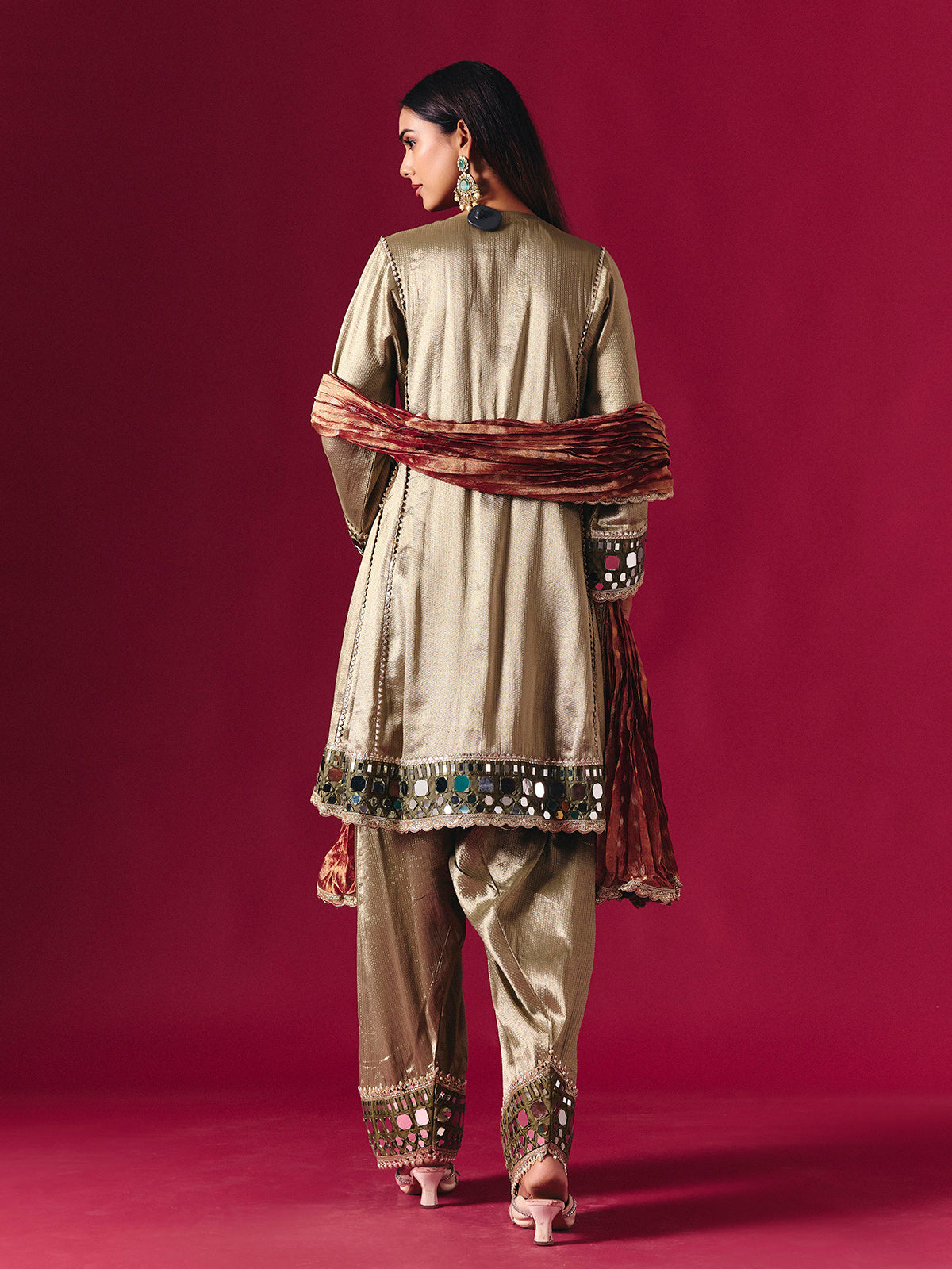 Regal gold silk salwar suit with zardosi embellished dupatta elegance