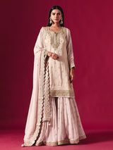 Light pink silk sharara suit with zari embellished elegance