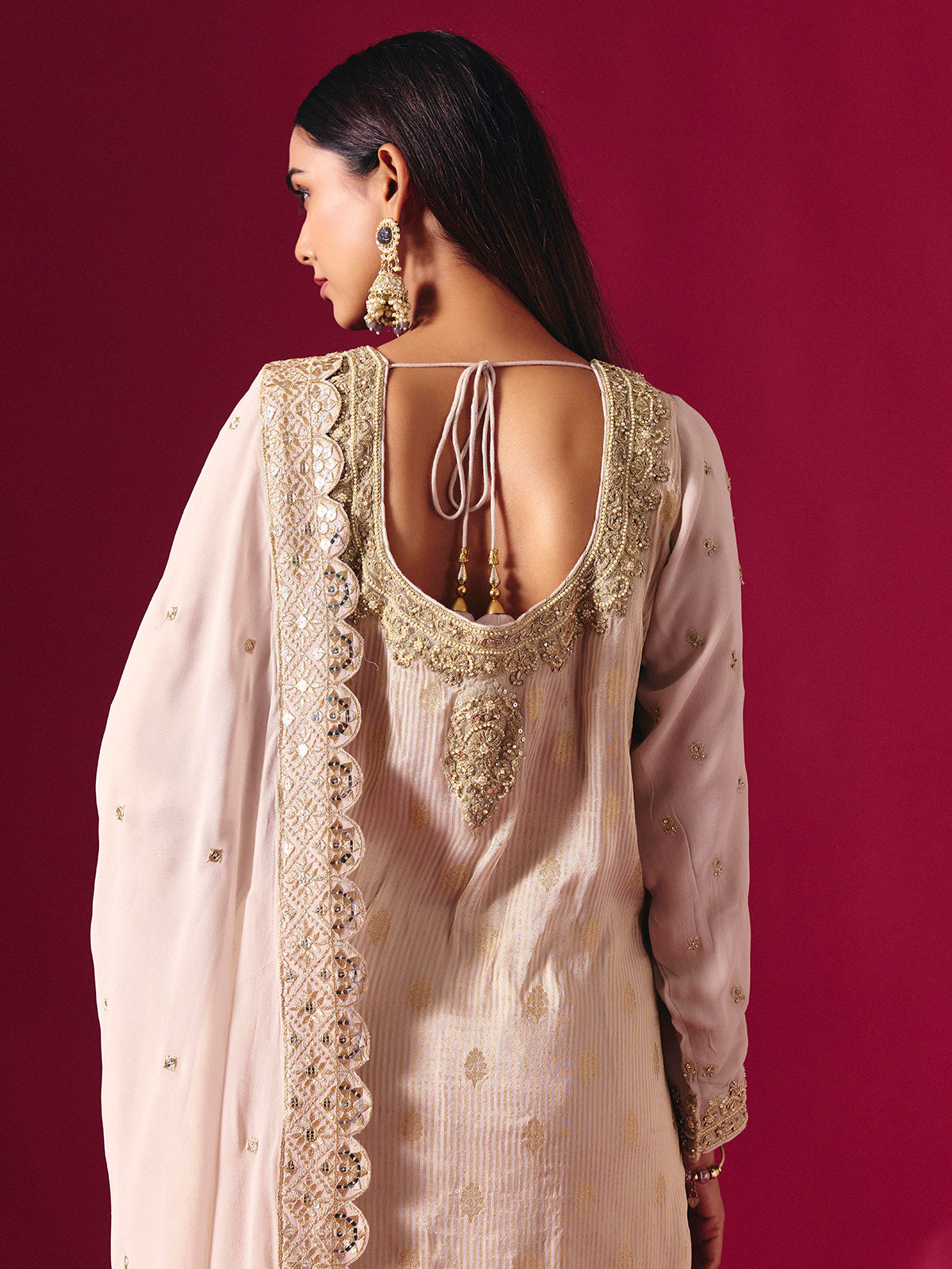 Light pink silk sharara suit with zari embellished elegance