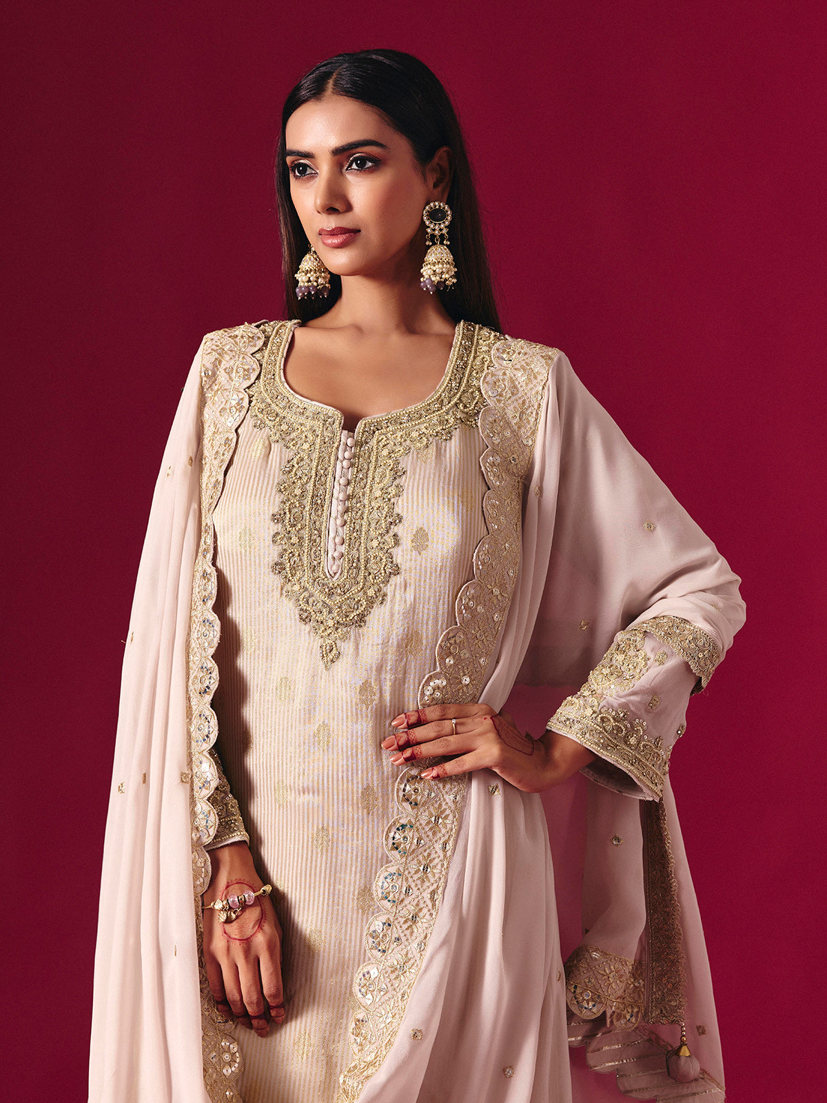 Light pink silk sharara suit with zari embellished elegance