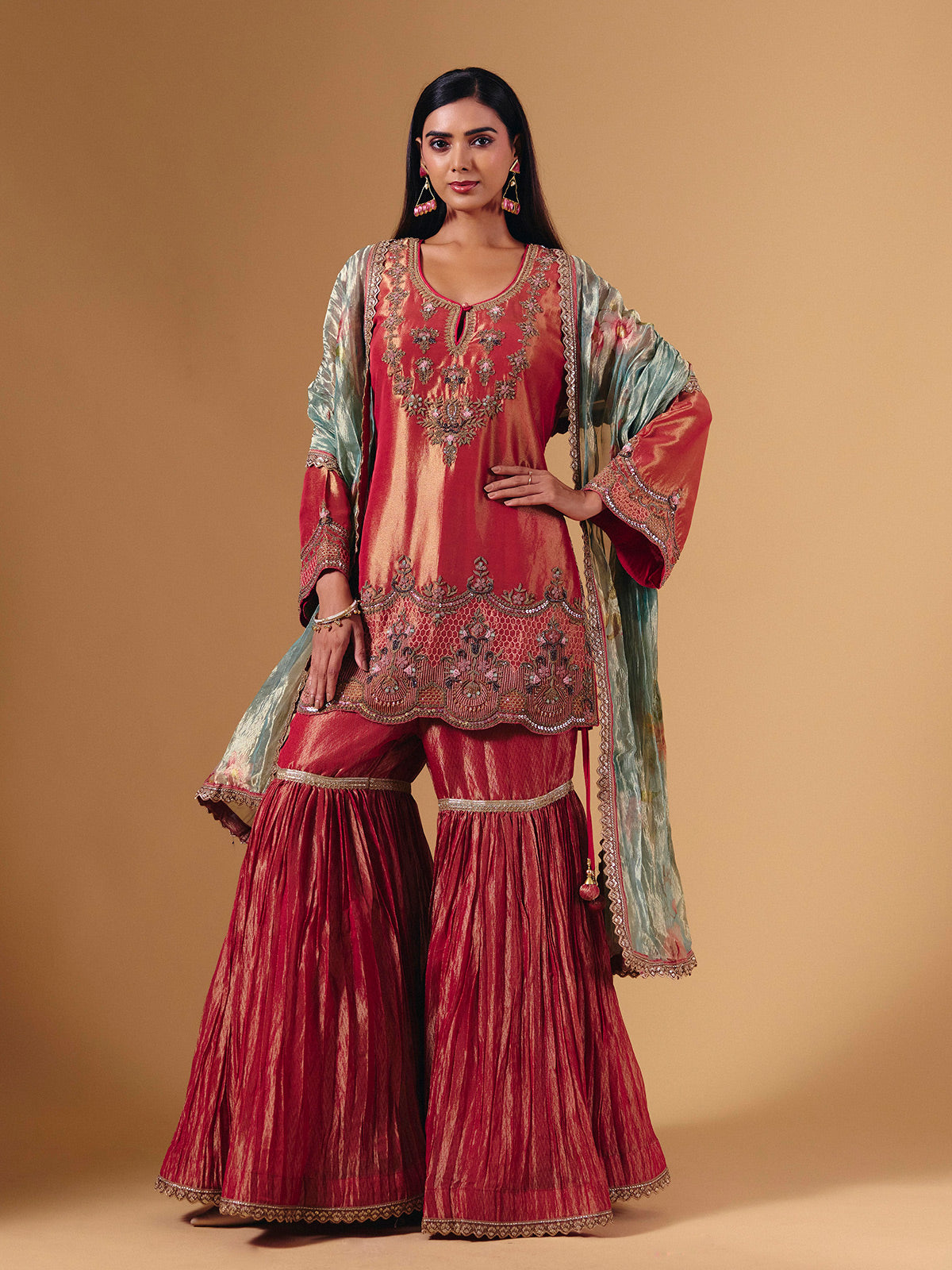 Pastel peach silk sharara suit with cutdana embellishments