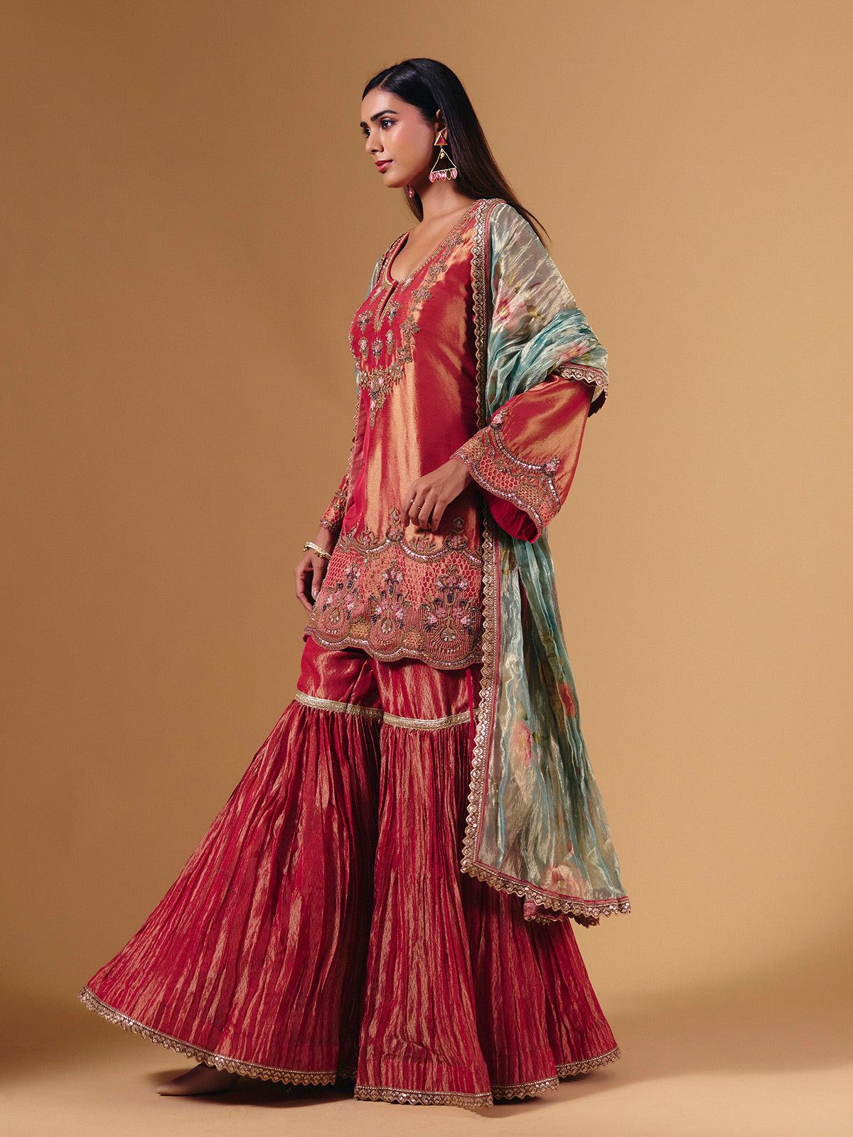 Pastel peach silk sharara suit with cutdana embellishments