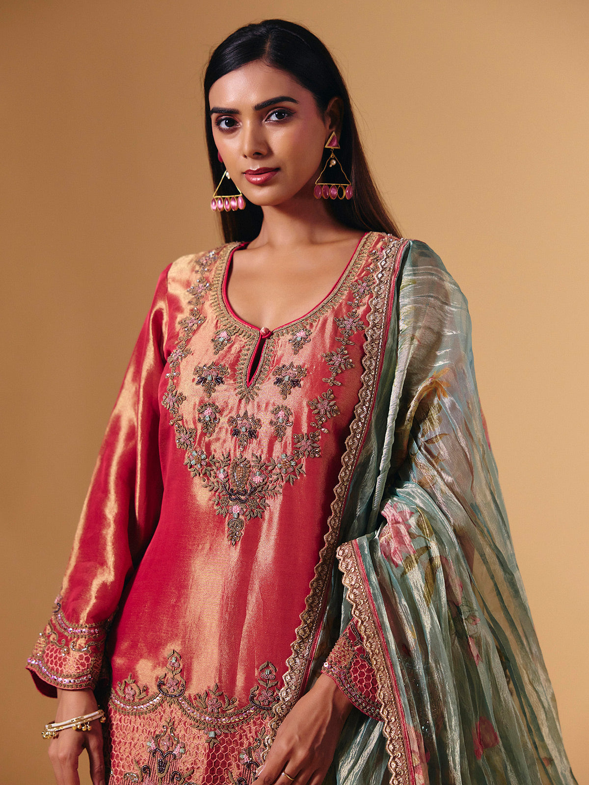 Pastel peach silk sharara suit with cutdana embellishments