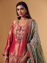 Pastel peach silk sharara suit with cutdana embellishments