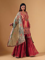 Pastel peach silk sharara suit with cutdana embellishments
