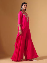 Elegant pink tissue silk palazzo suit with festive embellishments