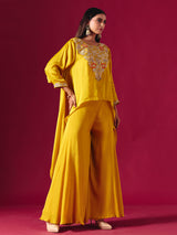 Vibrant yellow tissue silk palazzo suit with festive detailing