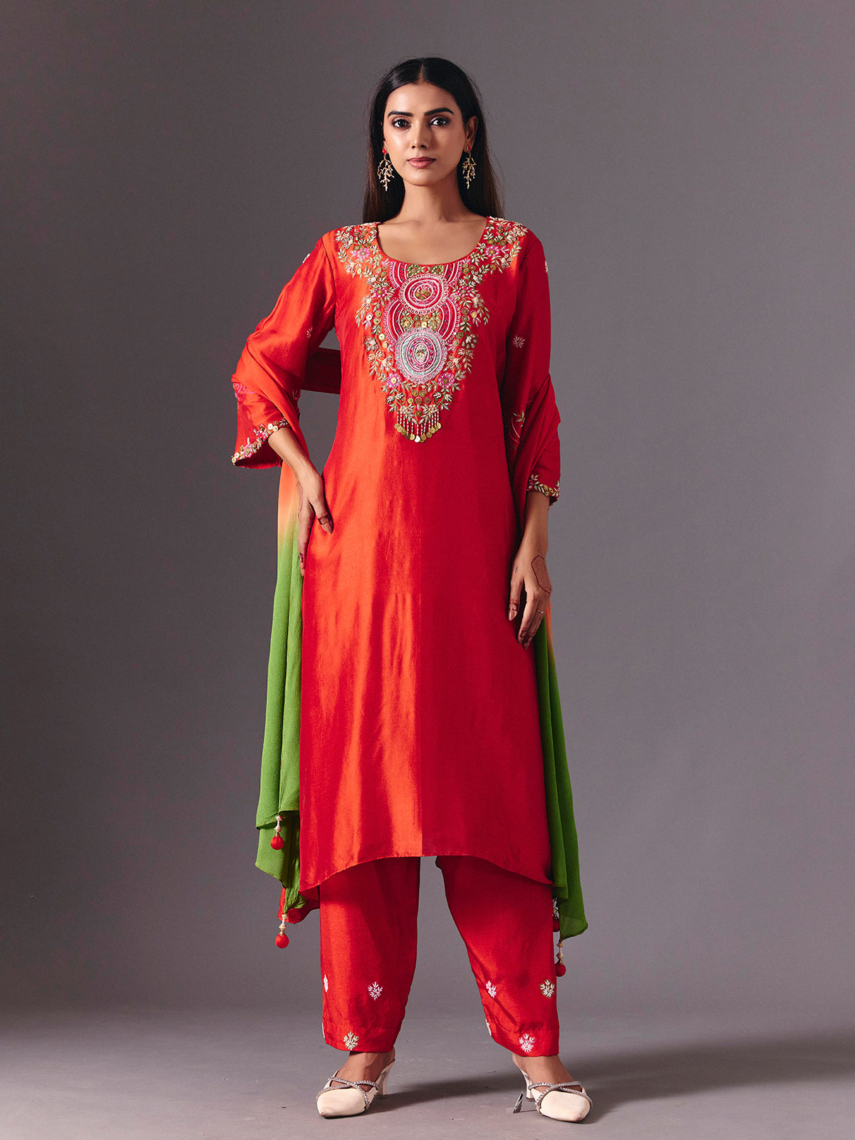 Radiant orange silk pant suit with zardosi embellishments