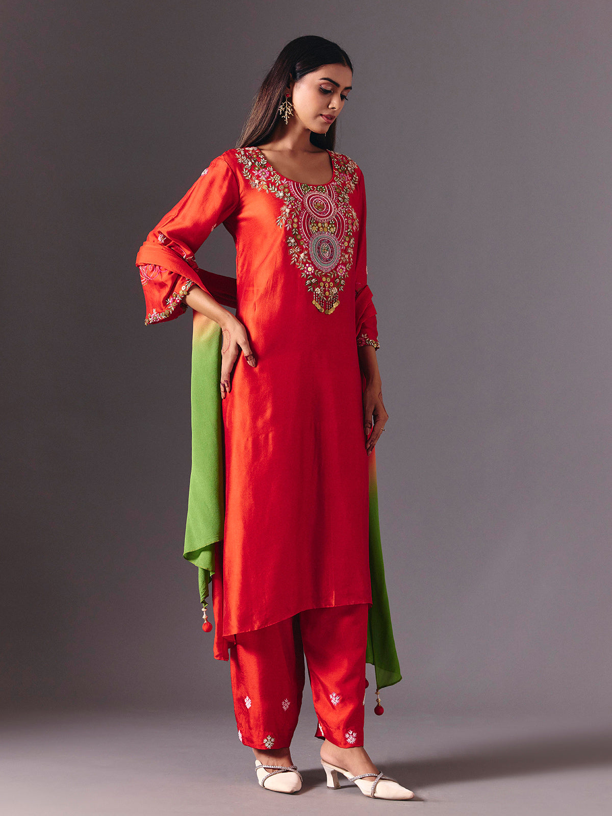 Radiant orange silk pant suit with zardosi embellishments