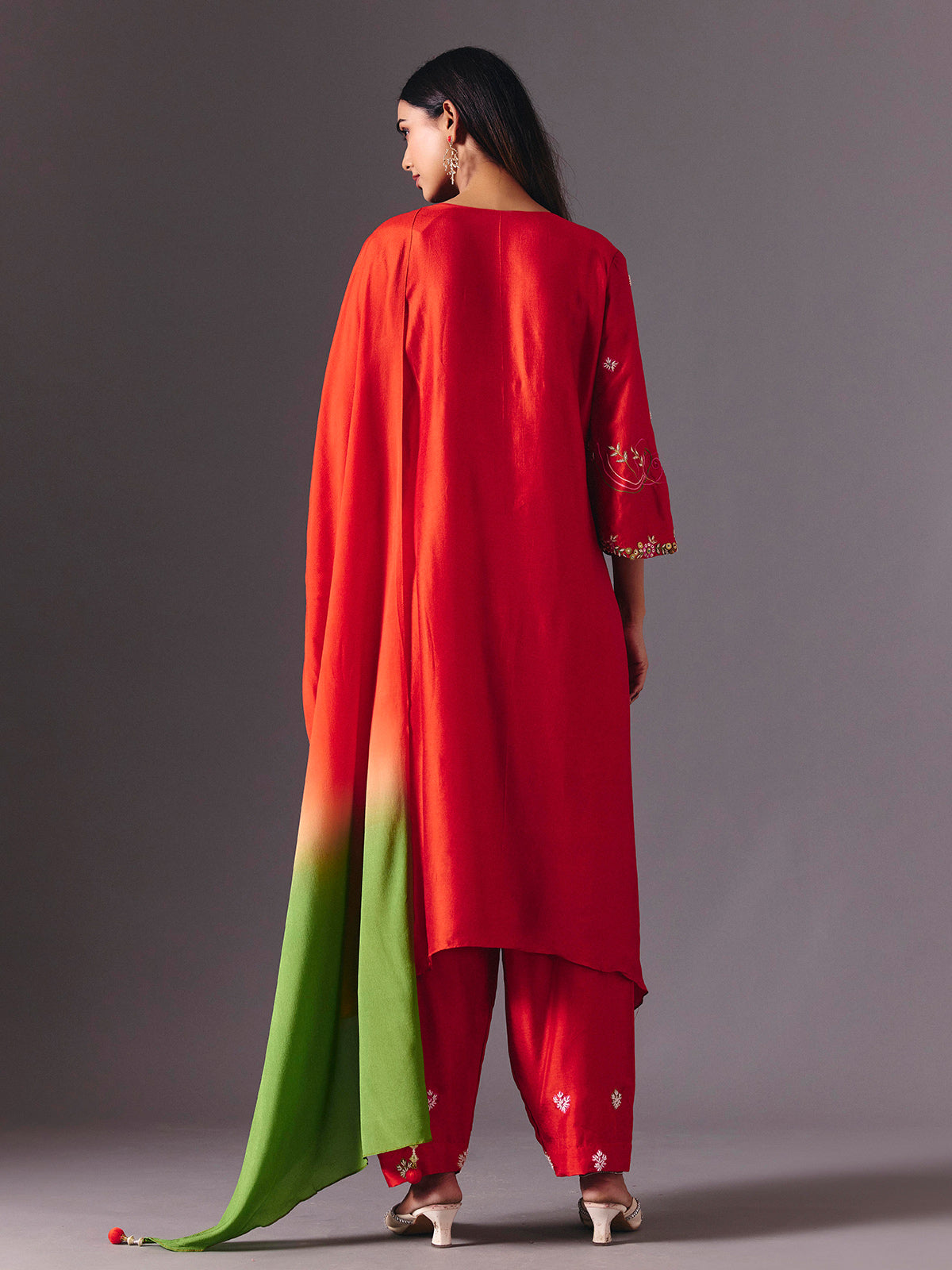 Radiant orange silk pant suit with zardosi embellishments
