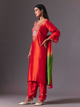 Radiant orange silk pant suit with zardosi embellishments