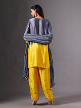 Yellow silk shaded salwar suit with purple dupatta and embellishments