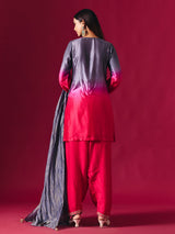 Pretty pink silk shaded salwar suit with purple dupatta detailing