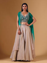 Elegant beige silk palazzo suit with sequins and shrug
