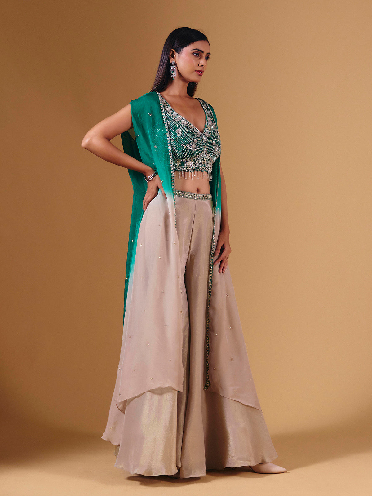 Elegant beige silk palazzo suit with sequins and shrug